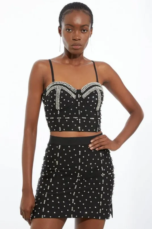 Figure Form Bandage Embellished Knit Mini Skirt