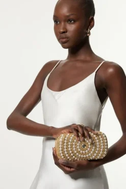 Golden Oval Detailed Pearl Embellished Clutch